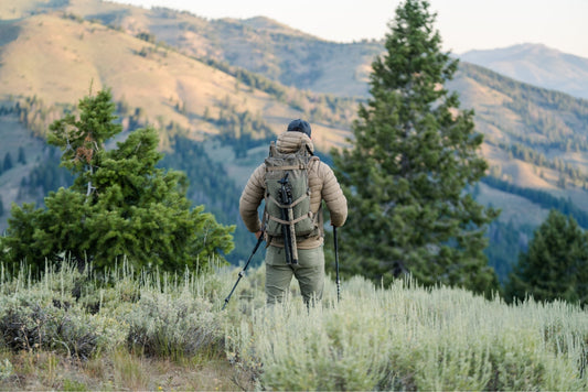Athlete rucking with a loaded Eberlestock pack during hunting season training